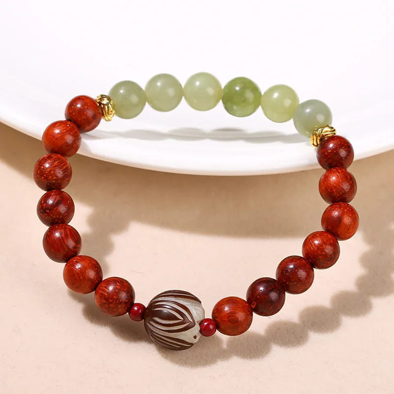 Red rosewood and grey jade Bodhi Lotus bracelet with geometric round beads.