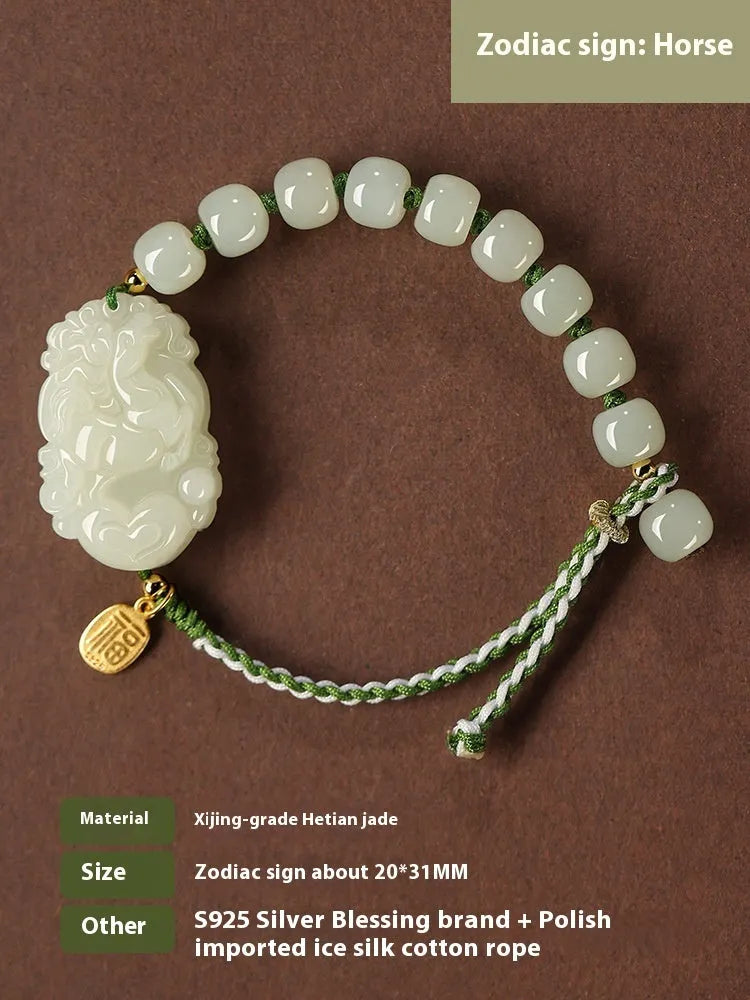 Rabbit Chinese zodiac bracelet with Hetian jade charm and silver card on a red rope.