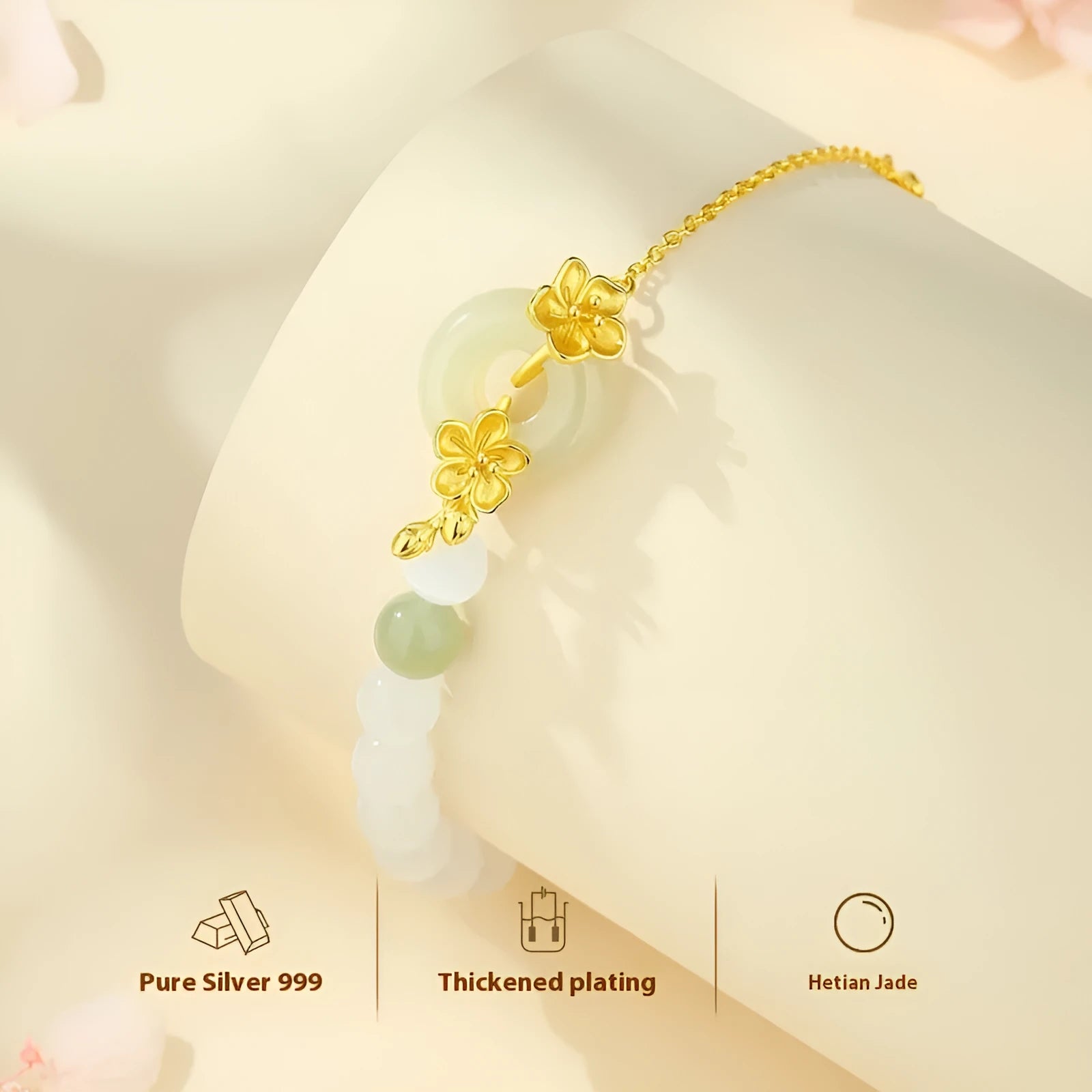 Women's silver peace buckle bracelet with floral design and safety closure mechanism in gold electroplated finish