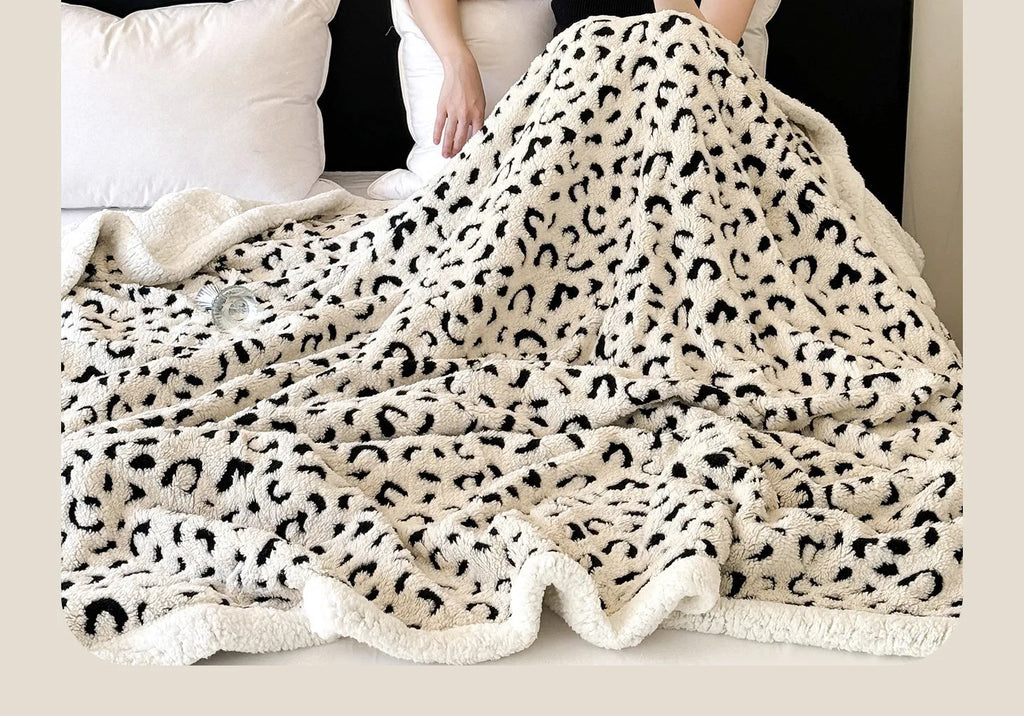 Leopard jacquard pattern taffeta blanket in camel colour with double-layer cationic construction