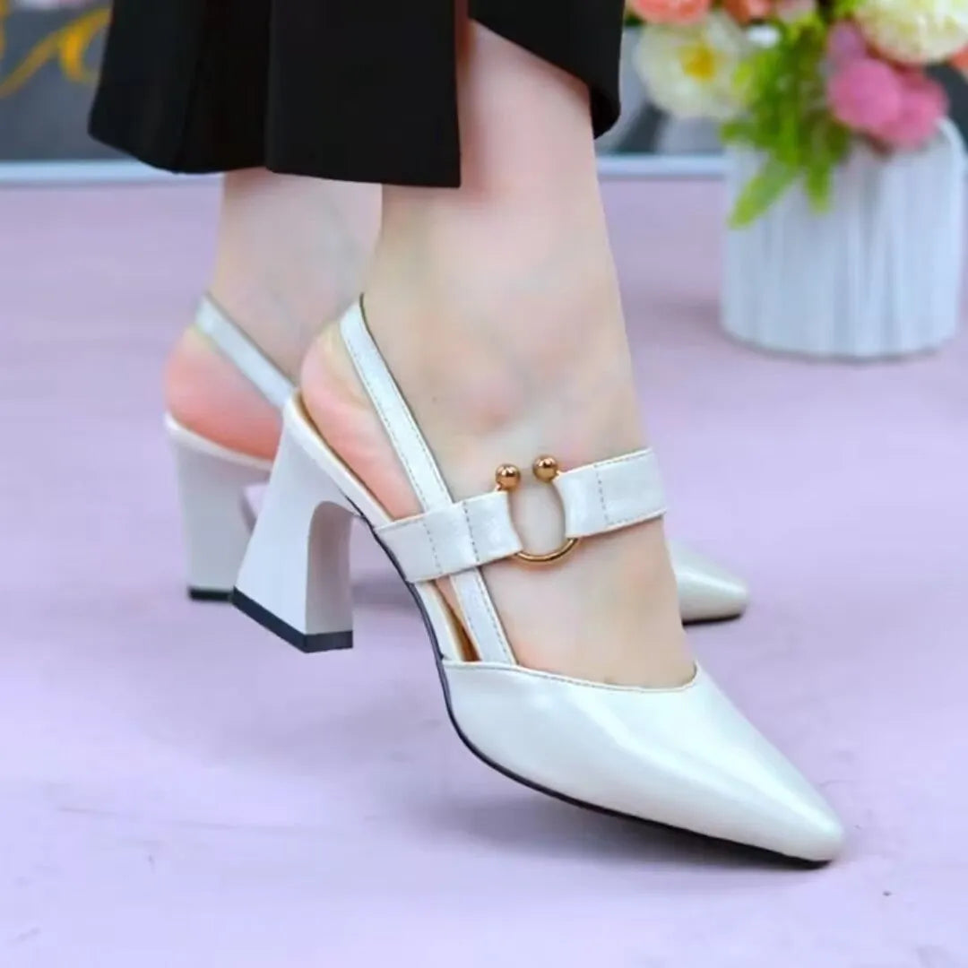 Women's apricot-colour leather sandals with a closed toe, open back, and a chunky high heel.