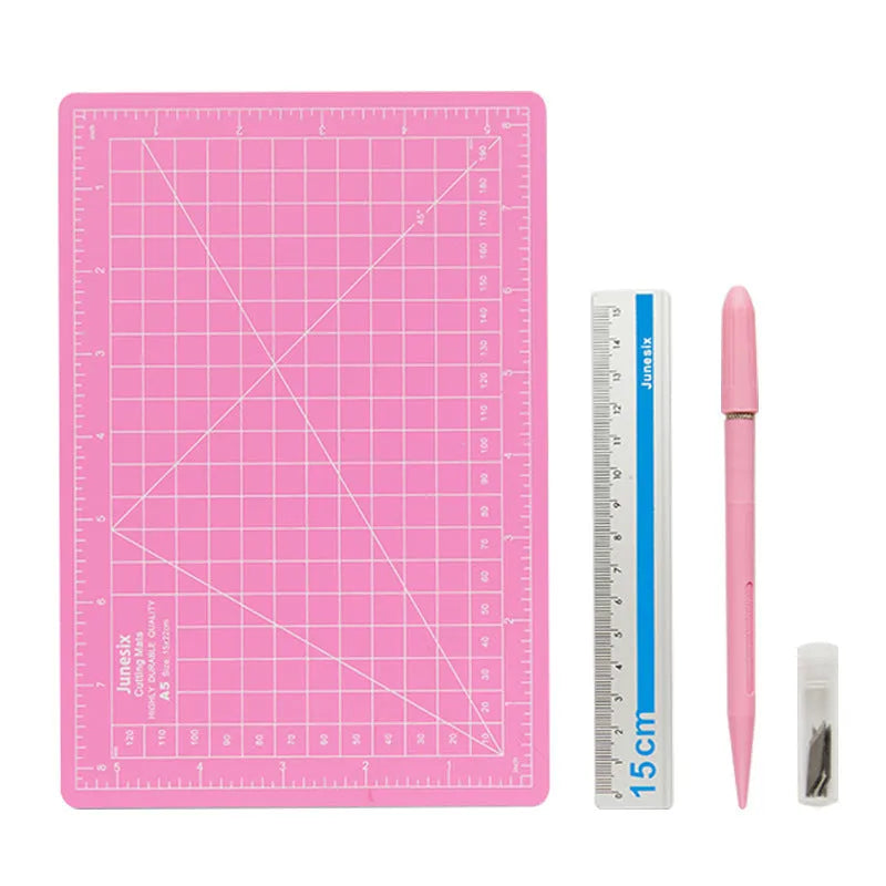 Art pen knife cutting board set in chosen colour with backing board, ruler, pen sharpener, and blade.