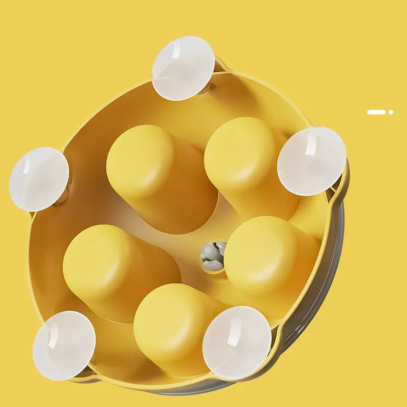 Yellow durable plastic cat snack bowl with divided compartments for foraging and slow feeding.