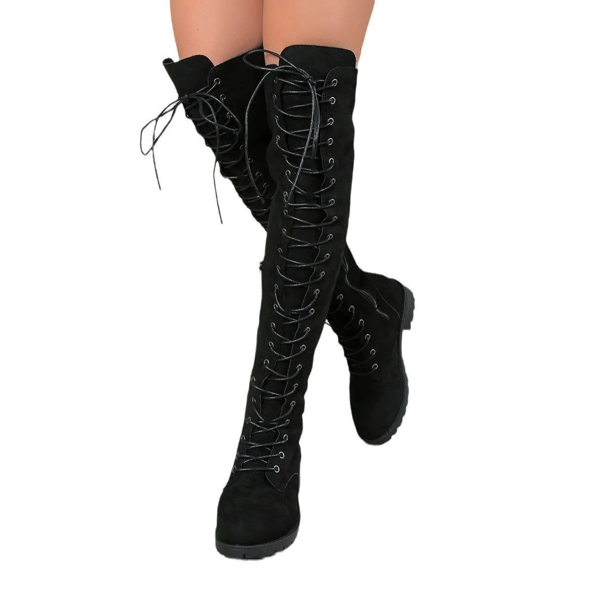 Black lace-up over the knee boots with a round toe and flat rubber sole on a neutral background.
