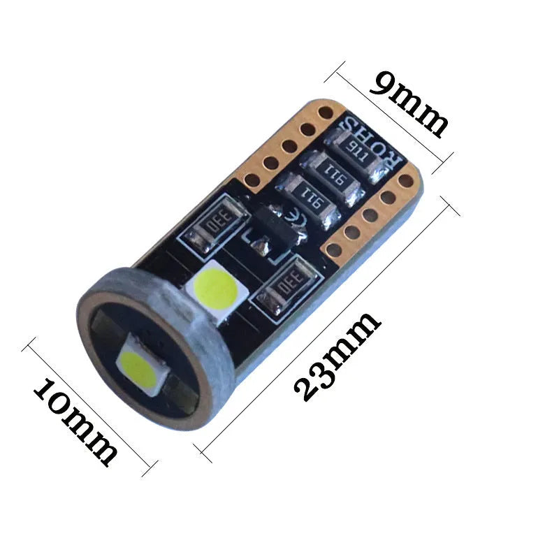 T10 W5W LED car light with blackboard white finish showing compact 23mm by 9mm dimensions