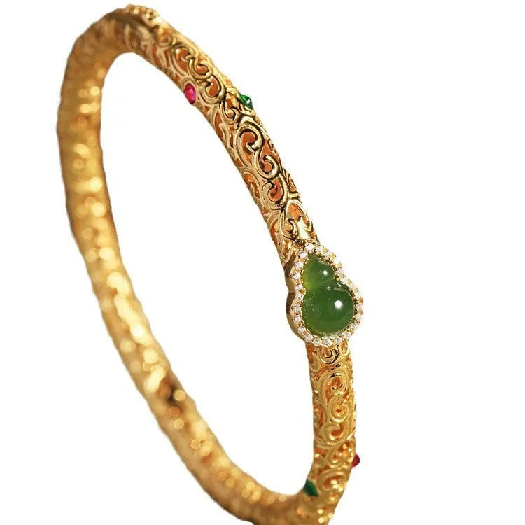 Gold-plated women's bracelet with xiangyun gourd design and retro opening style