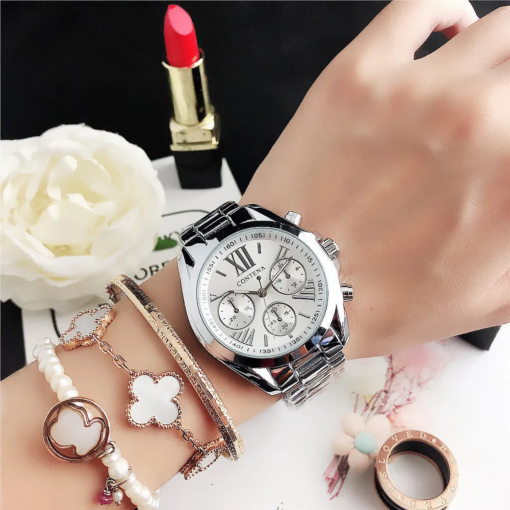 Women's silver and rose gold quartz watch with mesh strap and pointer display.