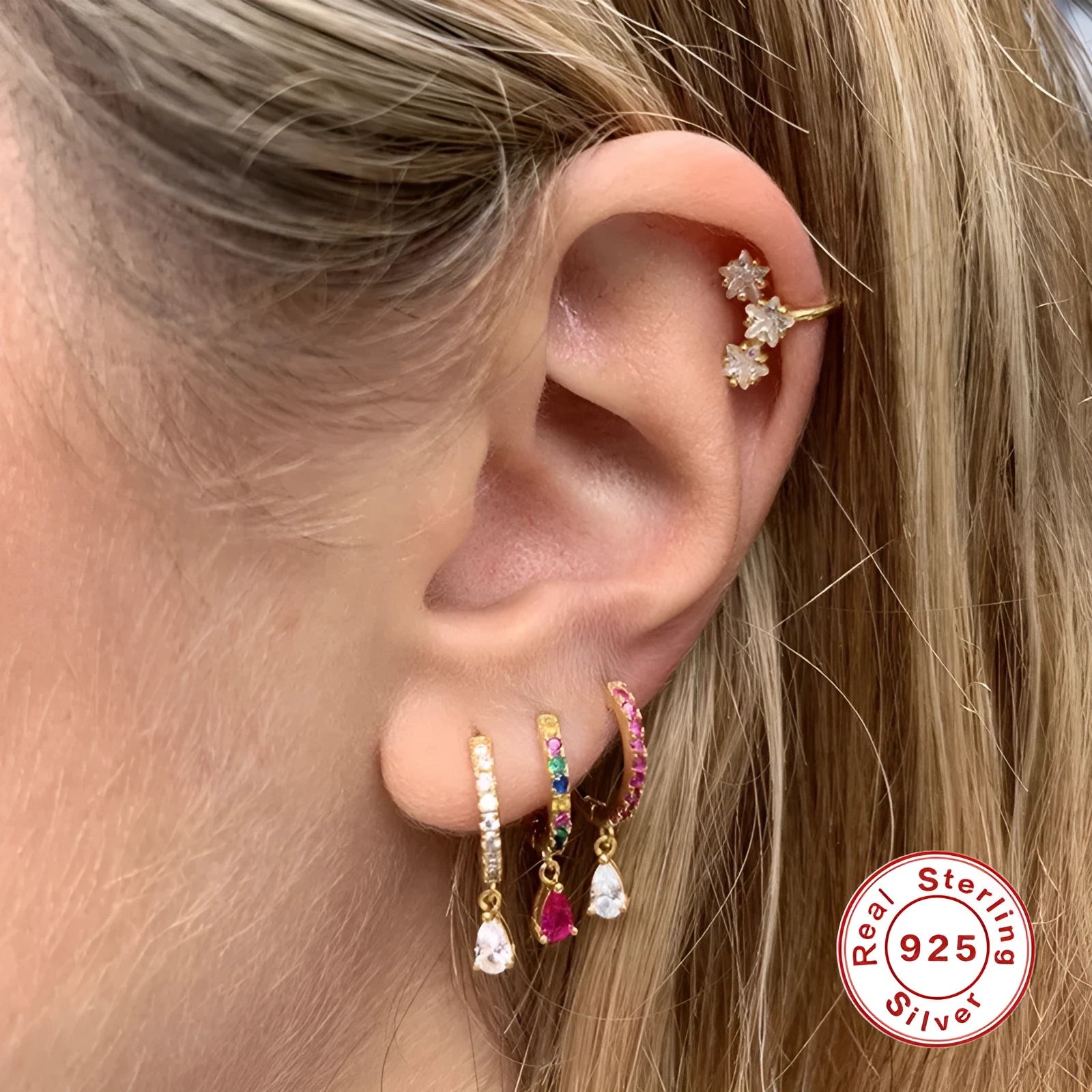 Sterling silver water drop eardrop earring with a coloured stone in a gold or silver plated setting.