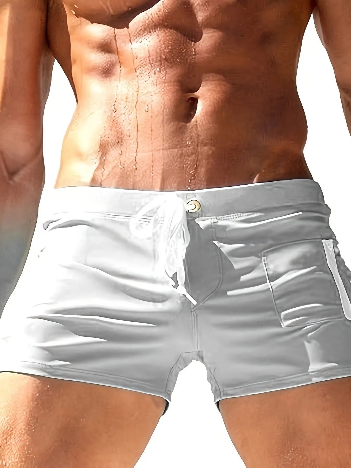 Men's black high-waist swimming trunks with a lace-up front closure.