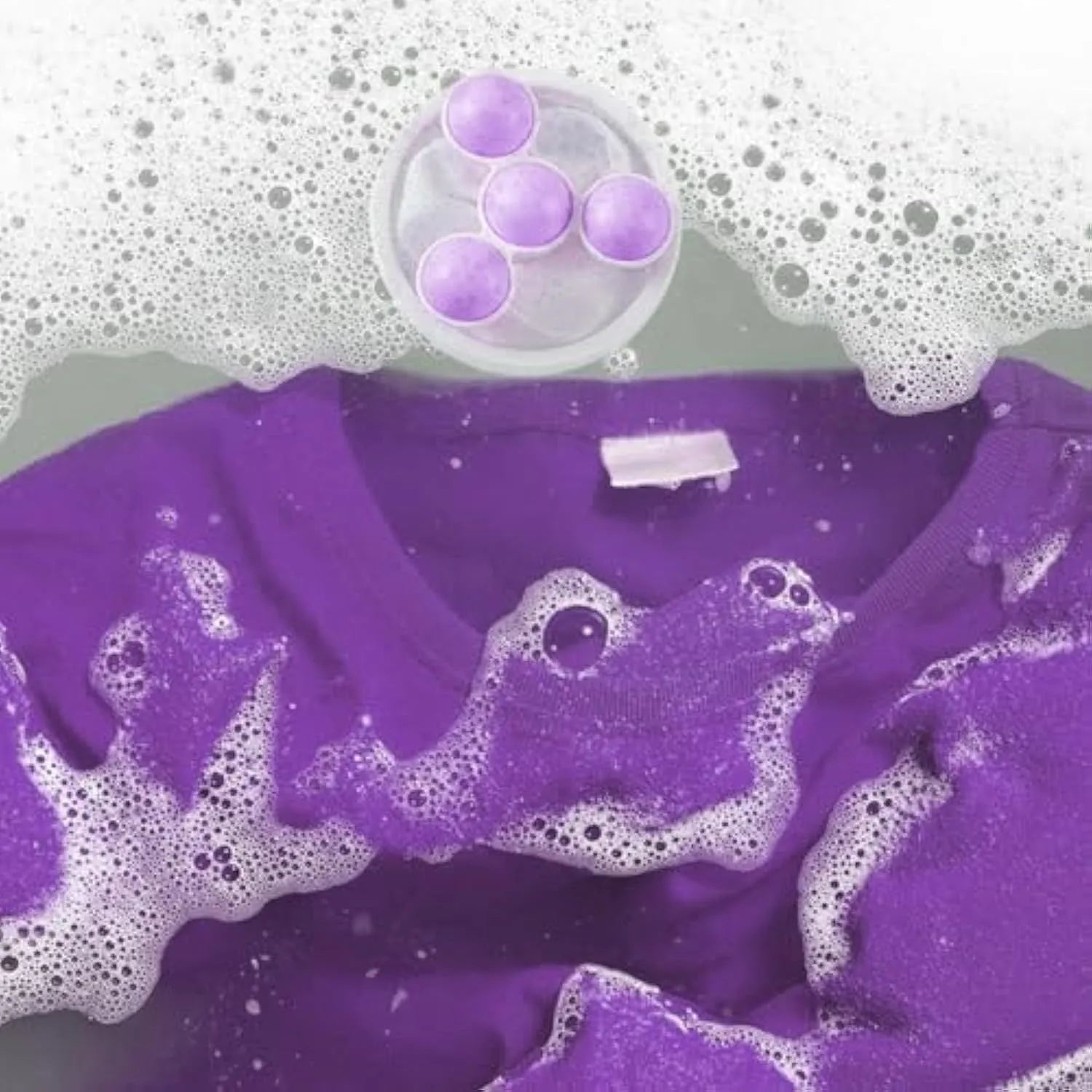 Set of three reusable pink, blue, and purple washing machine hair filter bags for catching pet hair and lint.