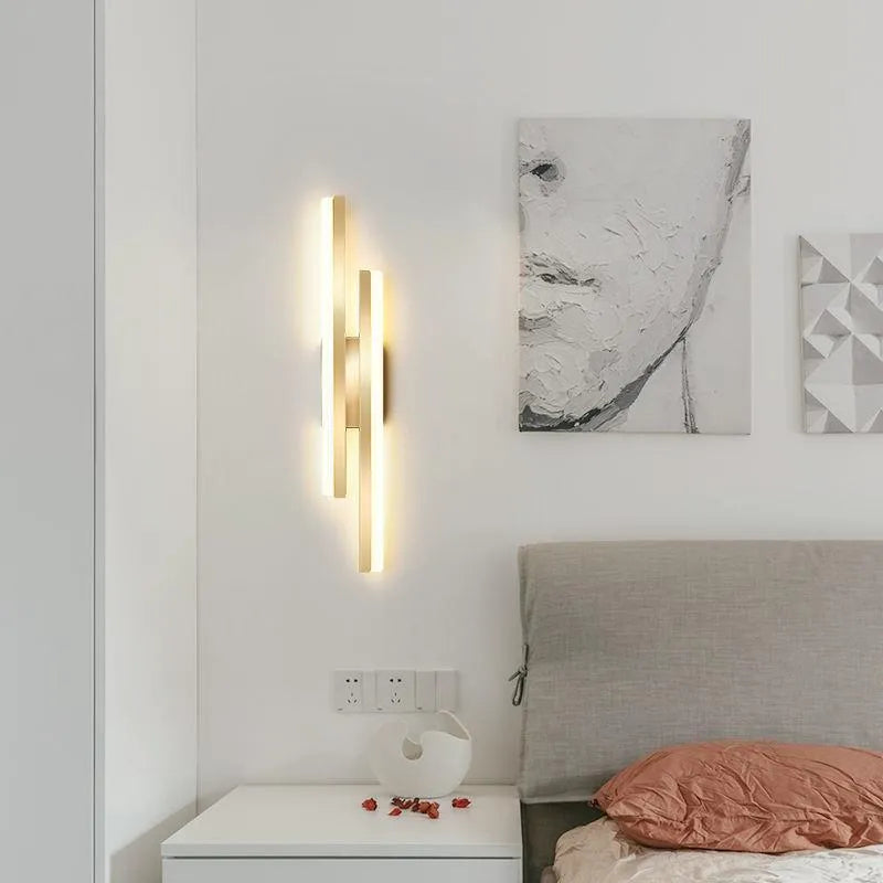 Minimalist Scandinavian-style acrylic LED wall lamp in black or gold, shown in left and right-handed orientations.