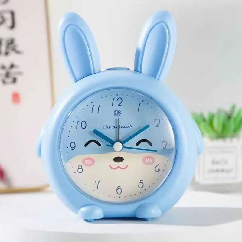Children's cartoon alarm clock with night light in pink and blue colours