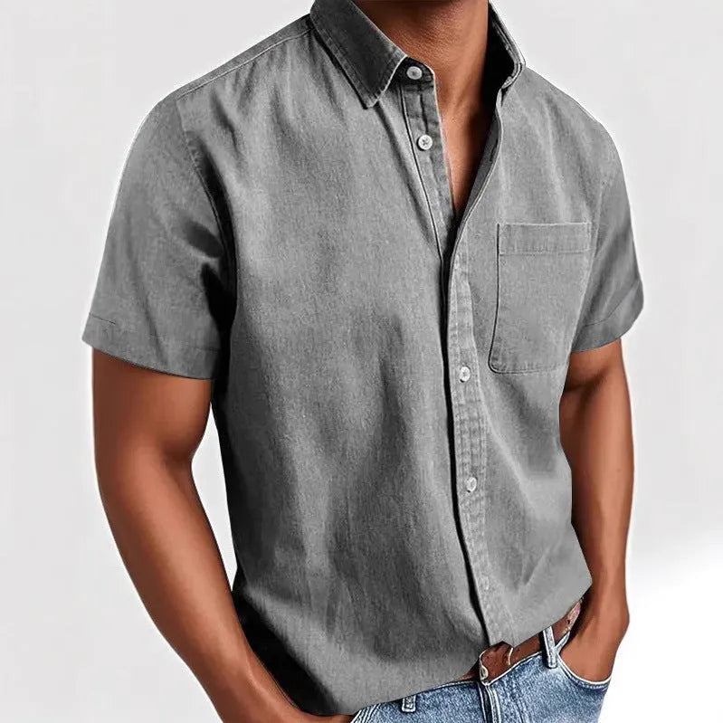 Men's solid colour short-sleeve shirt with a polo collar and a single chest pocket.