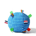 Blue rubber dog ball with a lattice texture and a central ring, shown as a chew and fetch toy.
