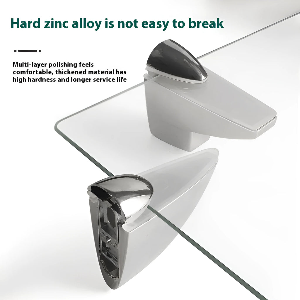 Set of silver electroplated adjustable partition clips in fish mouth and olecranon styles on a glass surface.