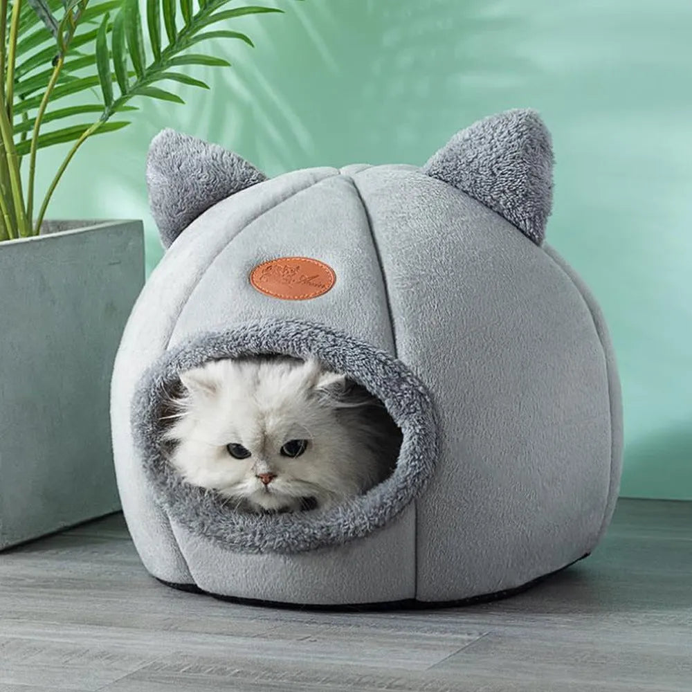 Large grey enclosed sofa-style winter nest cat bed for indoor cats, showing removable fleece lining.