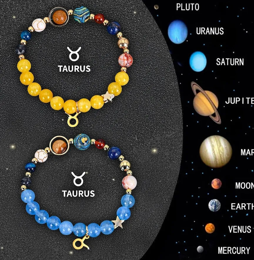 Two natural stone and glass beaded bracelets with zodiac sign designs on a flat surface
