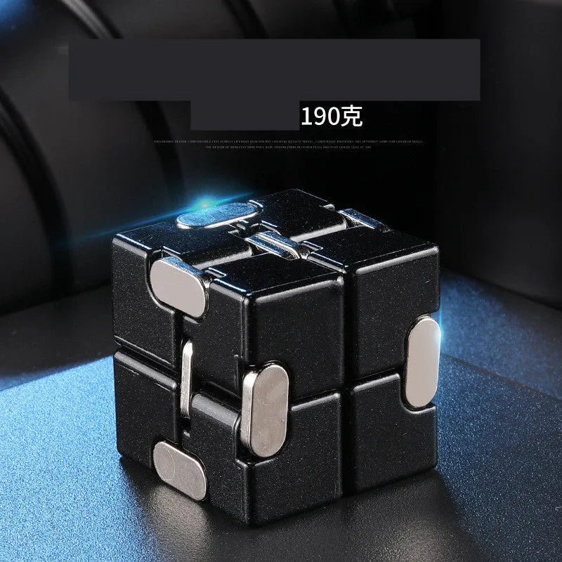 Zinc alloy infinity cube fidget toy in black finish showing rotating cube mechanism