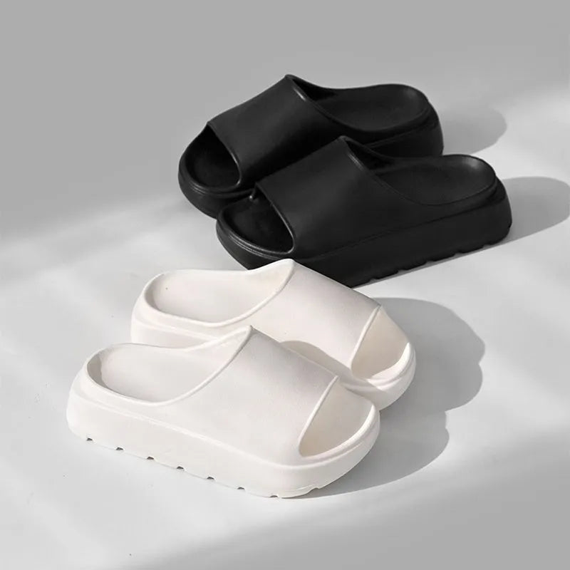 Women's beige fish mouth design beach slippers with a thick 5.5cm EVA sole.