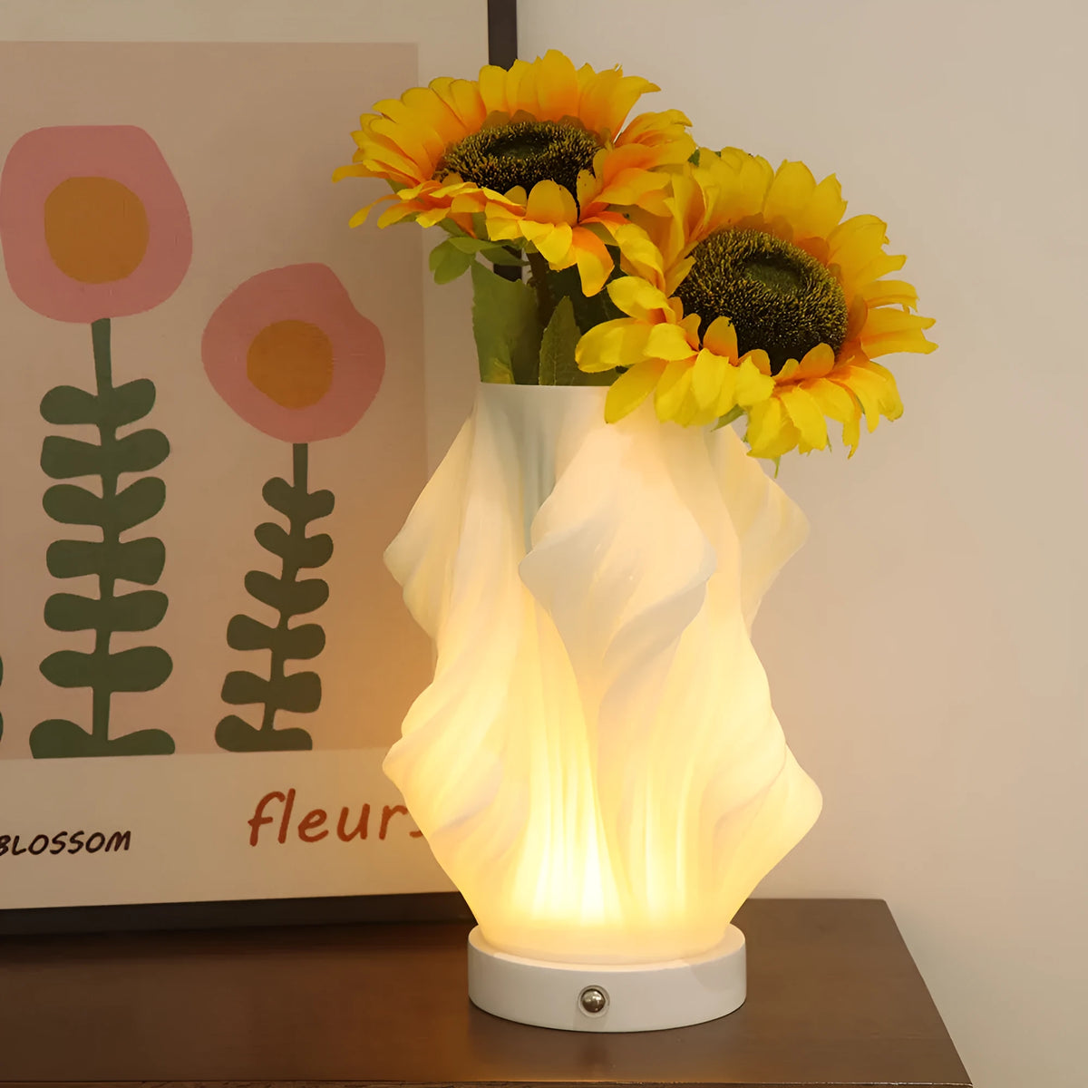 3D printed cylindrical vase night lamp with glass shade in wood colour finish on a bedside table