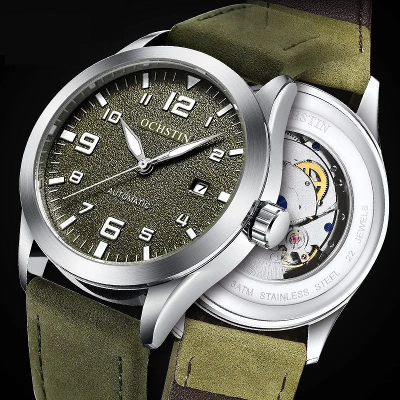 Men's automatic mechanical watch with leather strap on wrist, showing silver case and army green dial option.