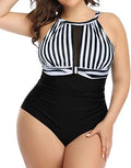 Women's black one-piece swimsuit with lace trim on mannequin, showing front and back.