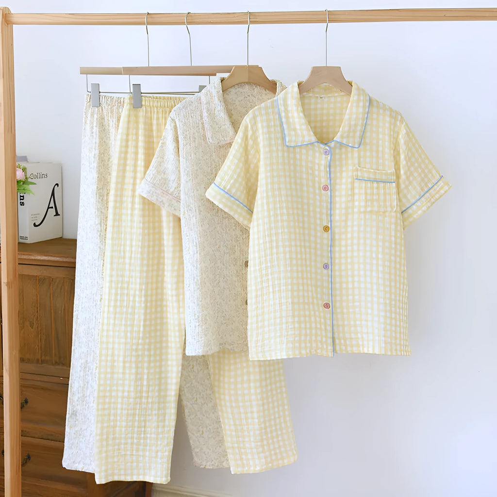 Women's washed cotton gauze short-sleeve top and loose trousers set in a floral or plaid print.