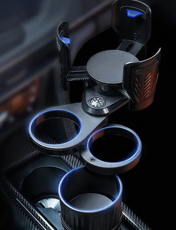 Carbon fibre black adjustable car cup holder with retractable base on a car centre console.
