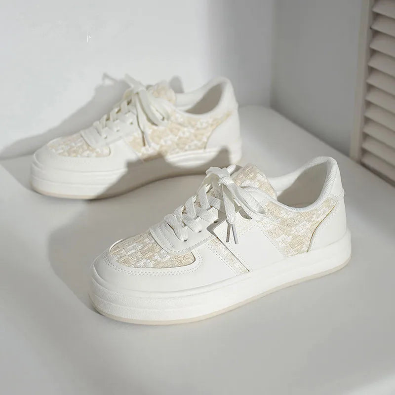Beige plaid platform leisure sports shoes with white rubber sole and front lace-up fastening.