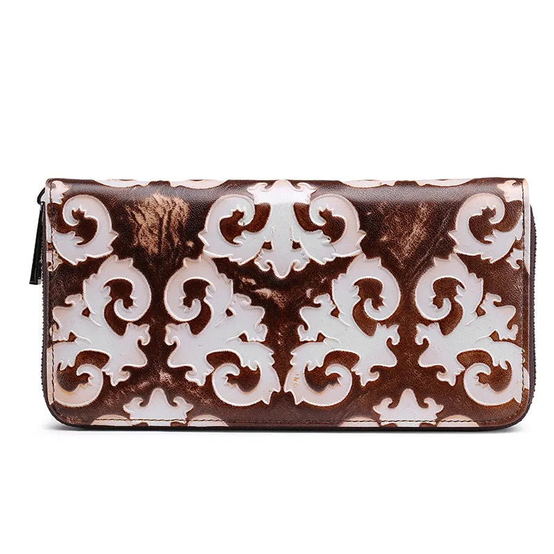 Brushed genuine leather women's retro wallet in brown white with embossed floral pattern and horizontal square shape.