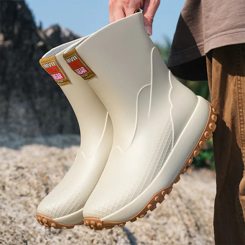 Men's PVC rain boots in black red colour with non-slip plastic soles and round toe design