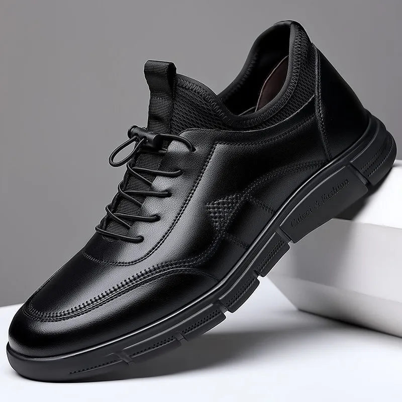 Black men's casual leather shoes with round toe and square low heel on a rubber sole.