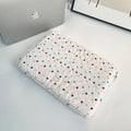 Polka dot patterned polyester laptop bag for women, shown in a solid colour with size options for 11, 13/14, and 15/15.6 inch laptops.