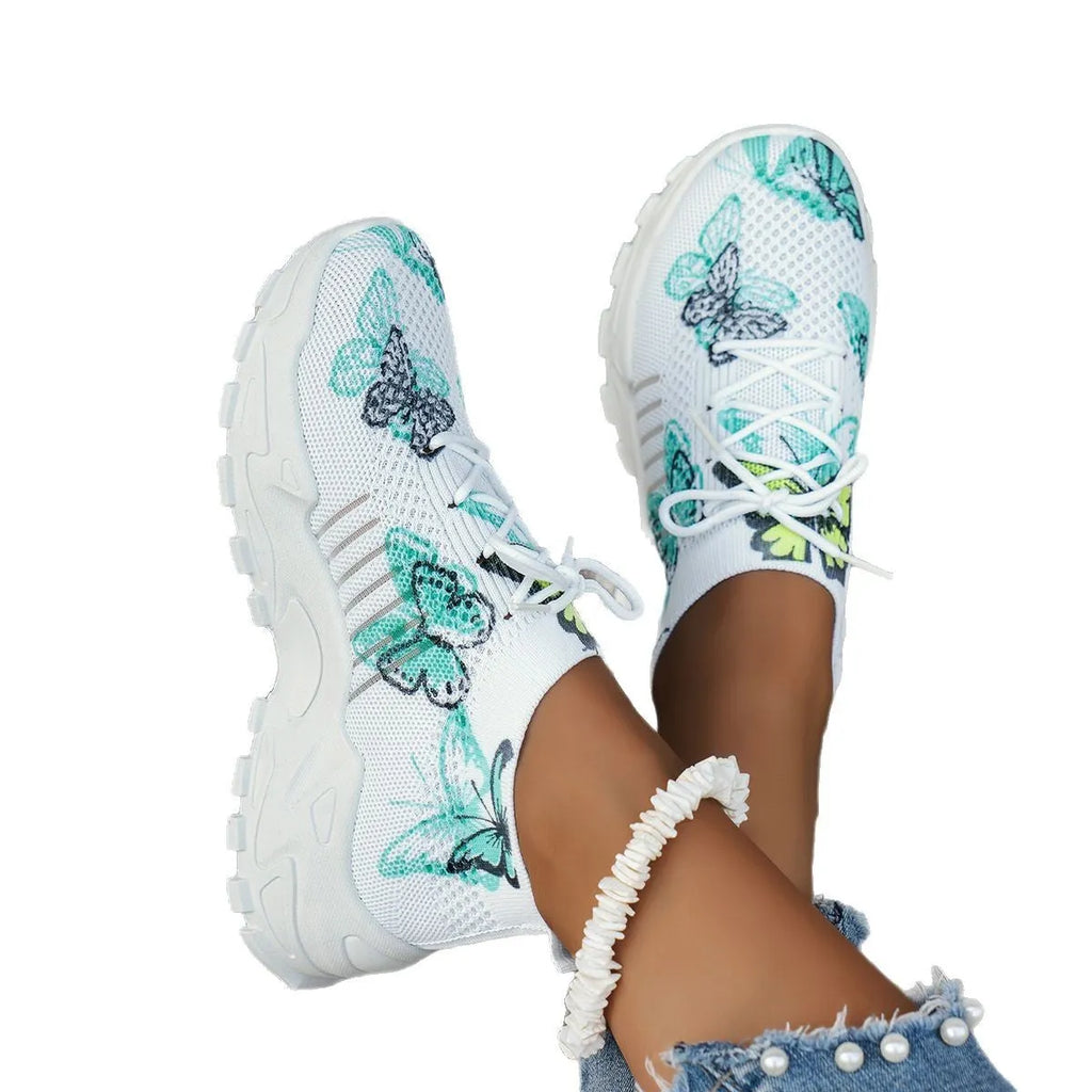 Butterfly print mesh sneakers for women in blue with flat heel, round toe, and front lace-up