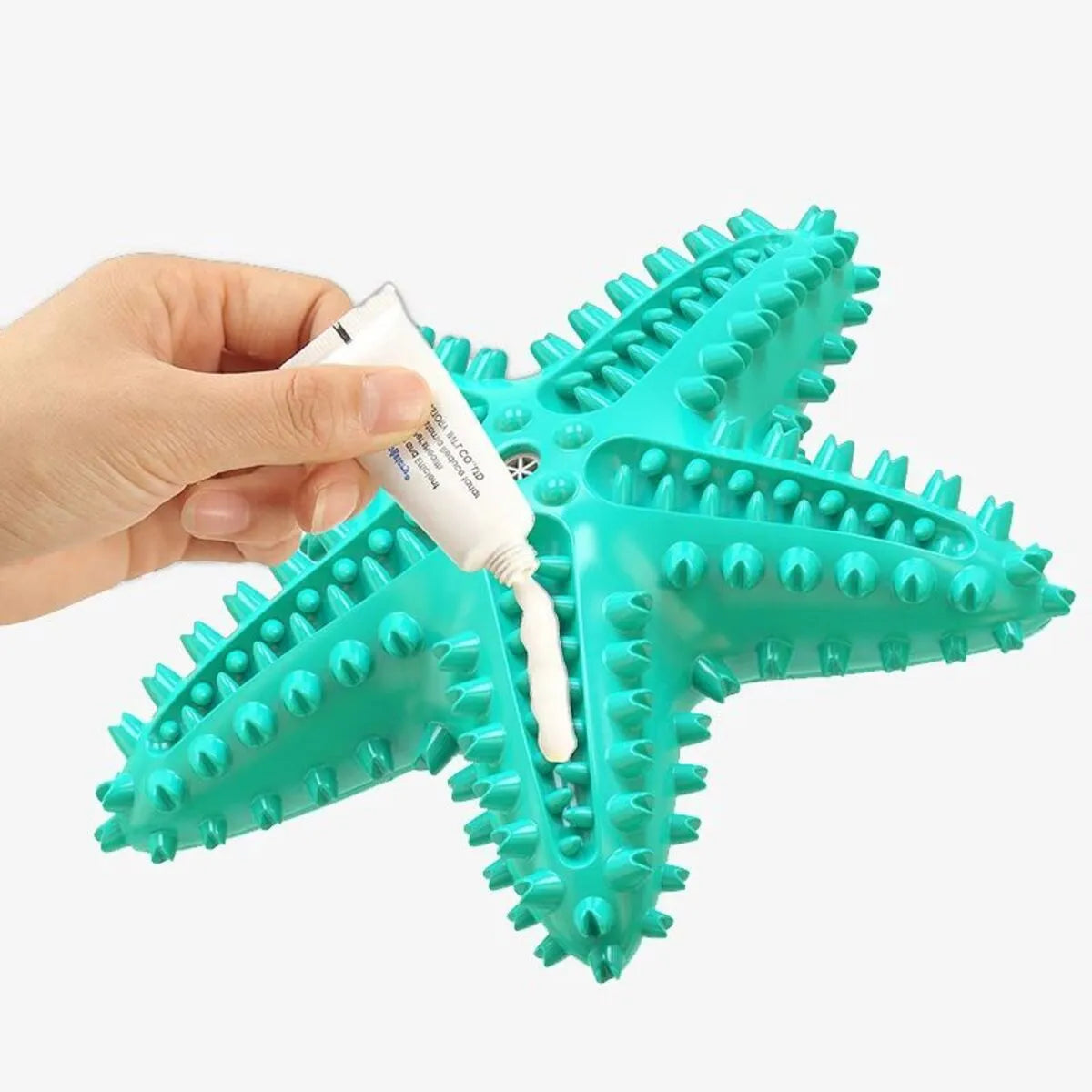 Edible TPR starfish-shaped dog toy for large breeds in blue, green and yellow colour options
