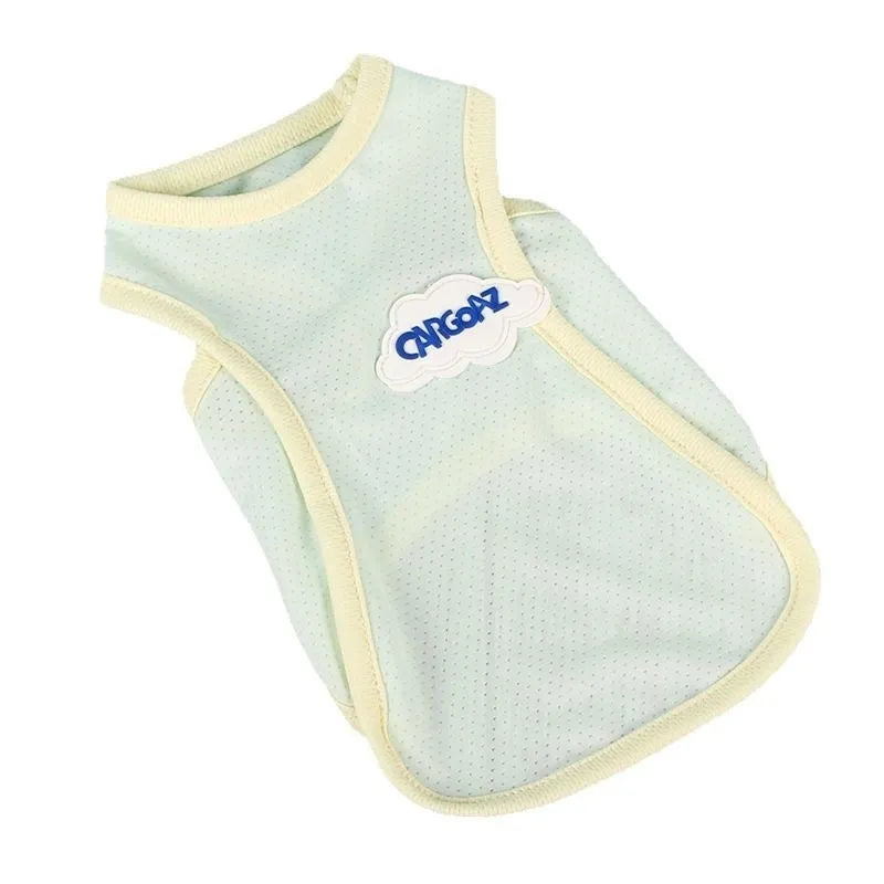 Grass green lightweight polyester vest for a cat on a summer day.
