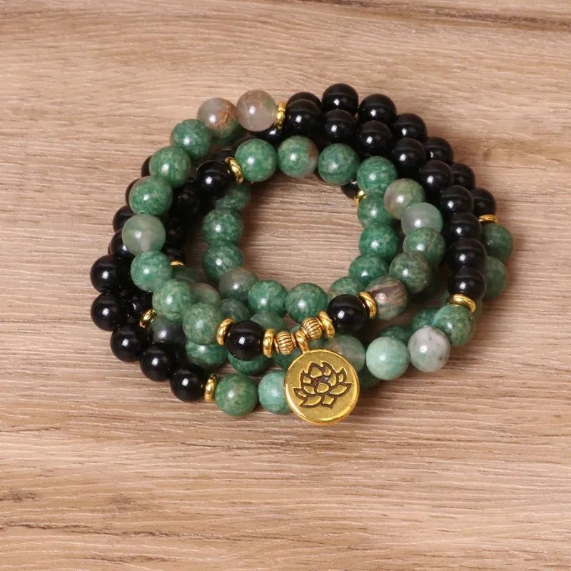 Green and black elastic beaded long bracelet with alloy beads on stretch cord