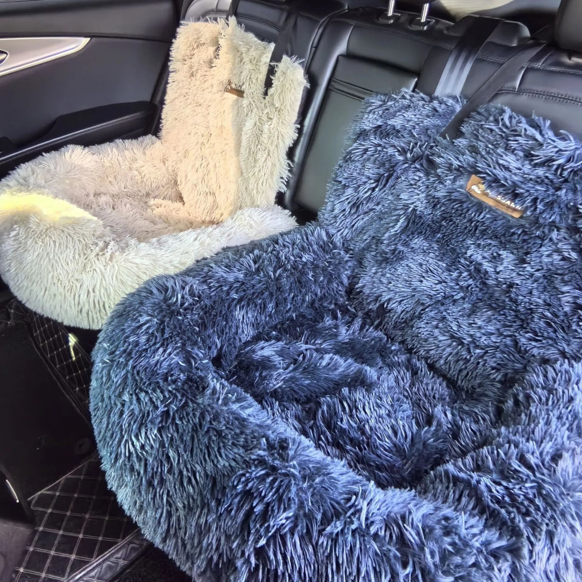 Dark grey thickened cloth pet mat placed on a car seat.
