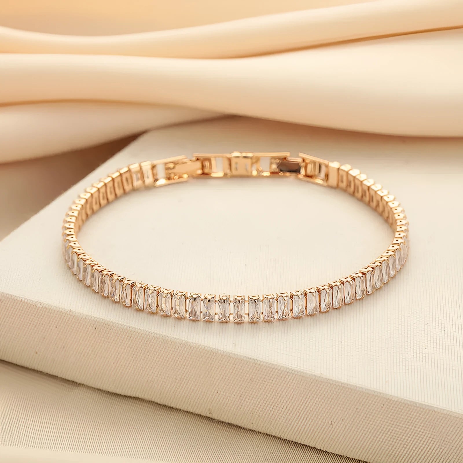 Rectangular brass women's bracelet with diamond zircon treatment in champagne gold colour