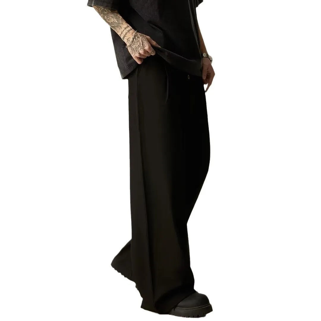 Men's black cotton blend straight-leg wide casual trousers with an elastic mid waist.