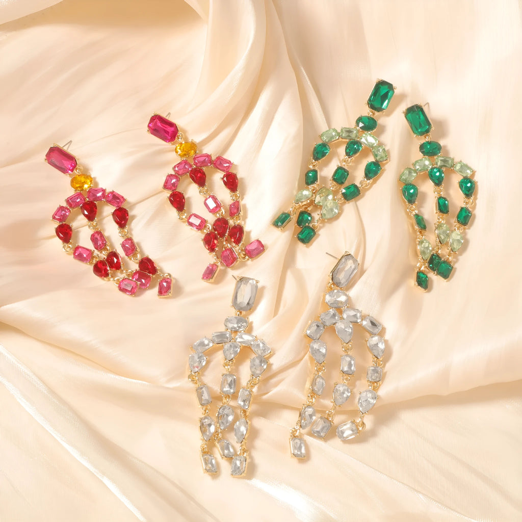 Heavy-duty full-drop diamond teardrop fringe earrings in zinc alloy, green colour, on display