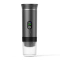 Black portable electric capsule coffee machine with LCD screen for use in cars and outdoor travel.