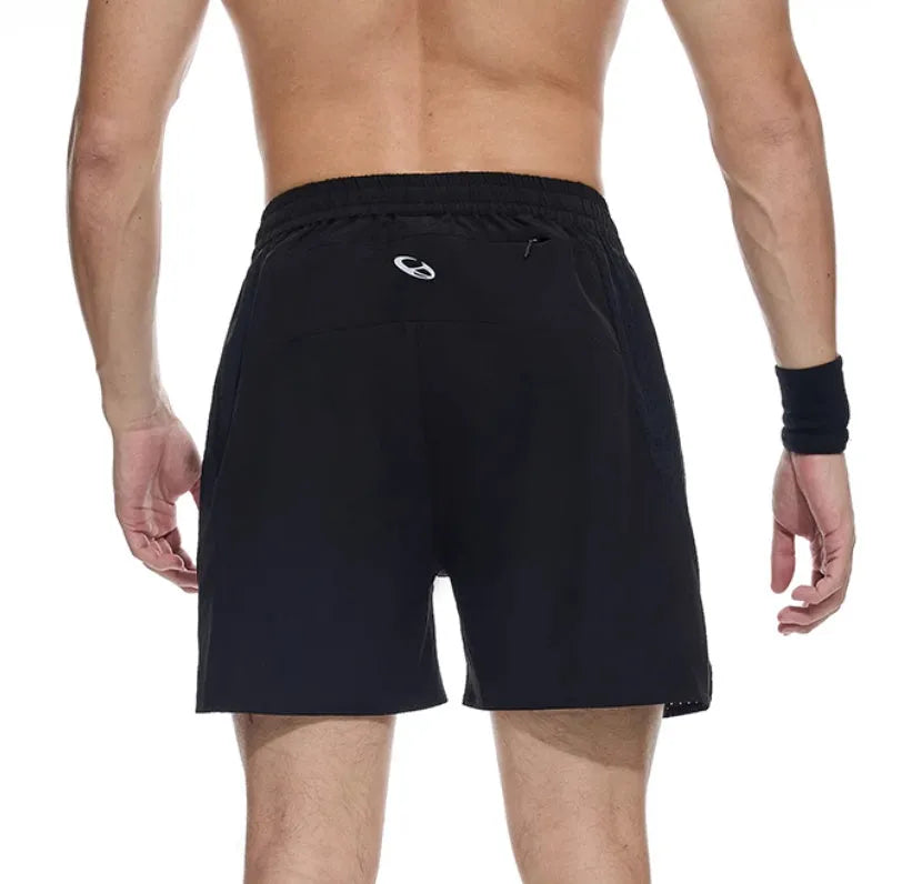 Black and blue four-point stretch running shorts with laser-punched seams on a mannequin.
