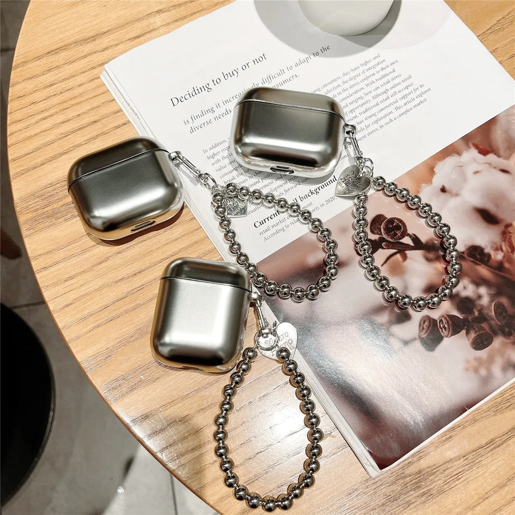 Matte plating AirPods protective case with electroplated detailing and bracelet element