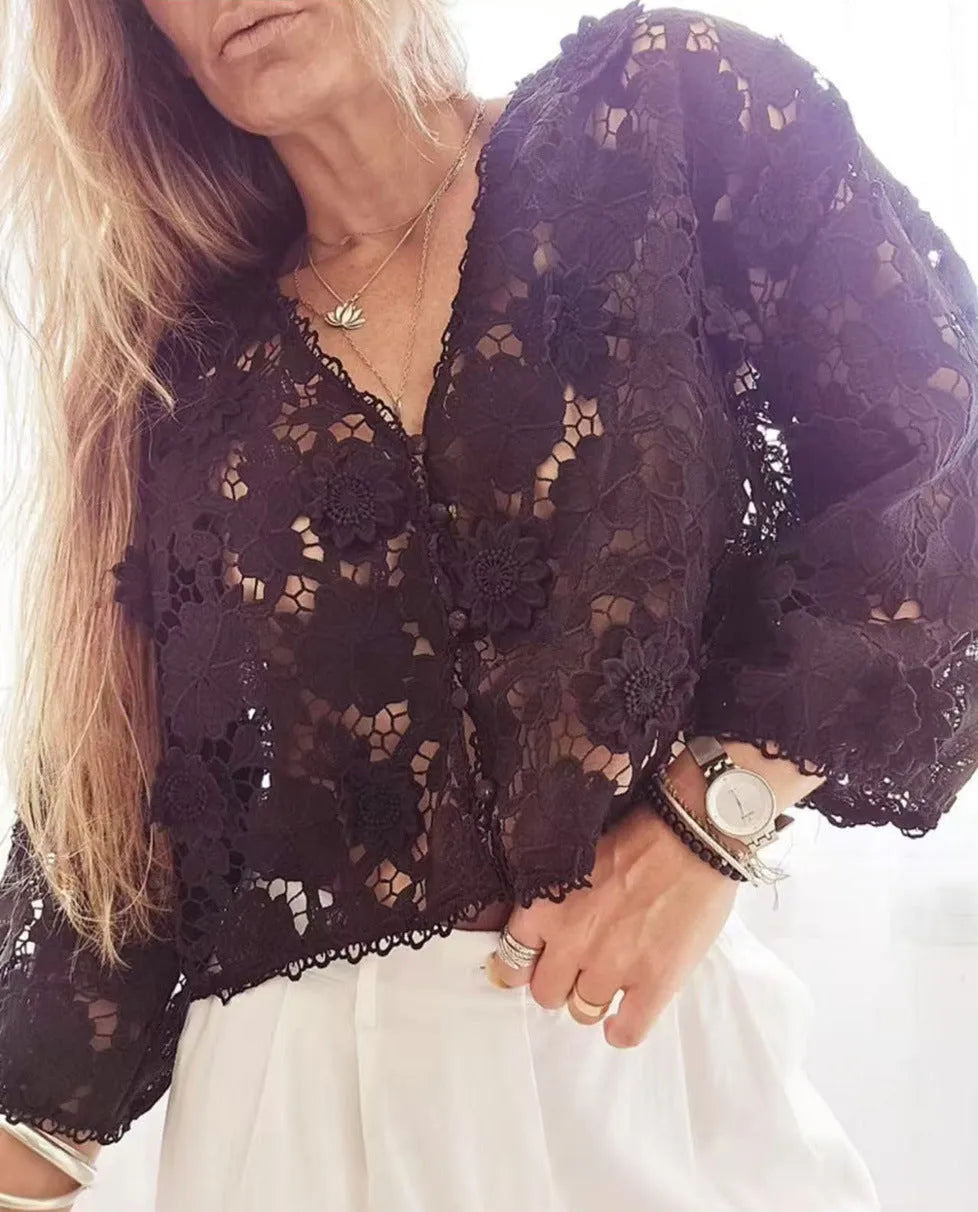 Loose V-neck cardigan with a 3D lace flower decoration in white.