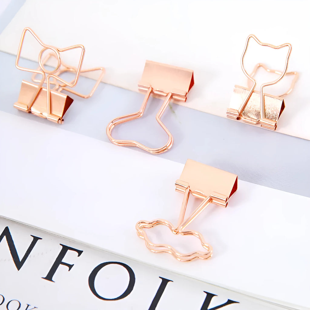 Gold-toned long tail metal office clip with decorative flamingo, love, clouds, cat, cactus, and bow design options.