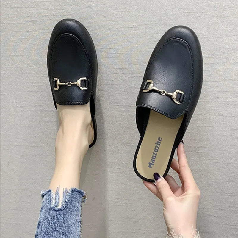 Women's closed toe half slippers in PVC with round toe and buckle fastening in multiple colour options
