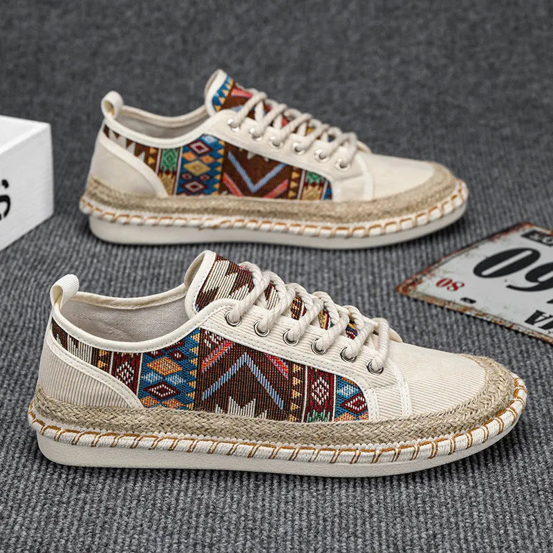 Men's summer casual shoes in beige and black with cloth uppers and slip-on design