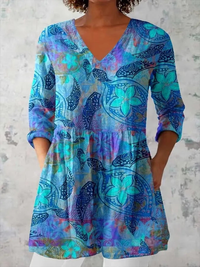 Women's slim-fit retro printed long-sleeved top in a solid colour on a hanger.