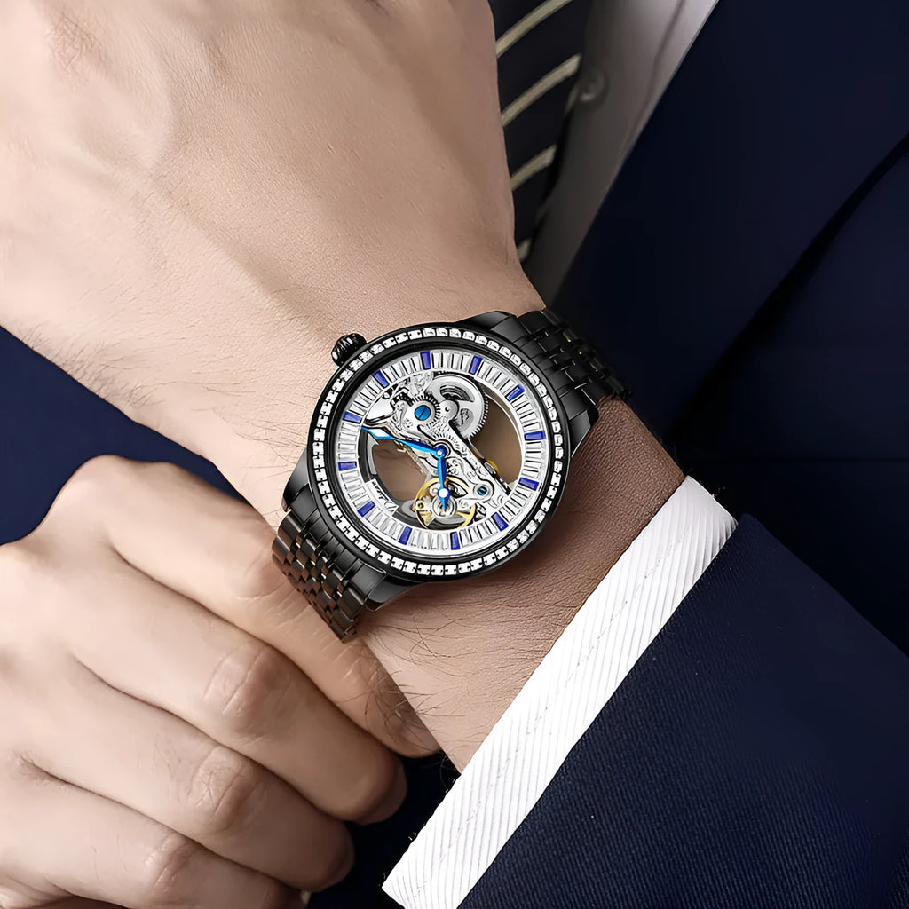 Men's zircon mechanical watch with stainless steel case and choice of strap on wrist.
